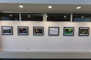An image of the second floor hallway with student work hanging gallery style.